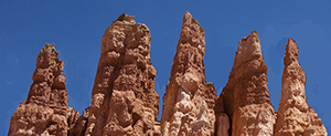 Photo image of five rock pinnacles